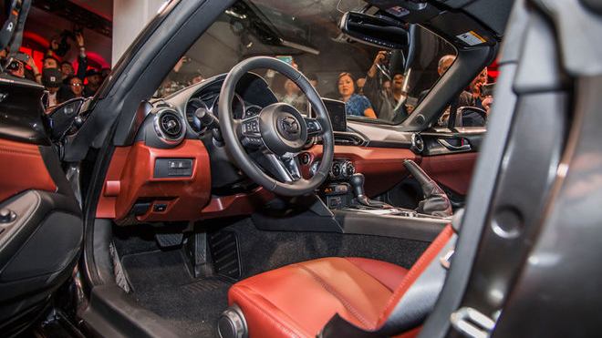 2017-Mazda-MX-5-Miata-RF-on-stage-interior-with-door-open.jpg