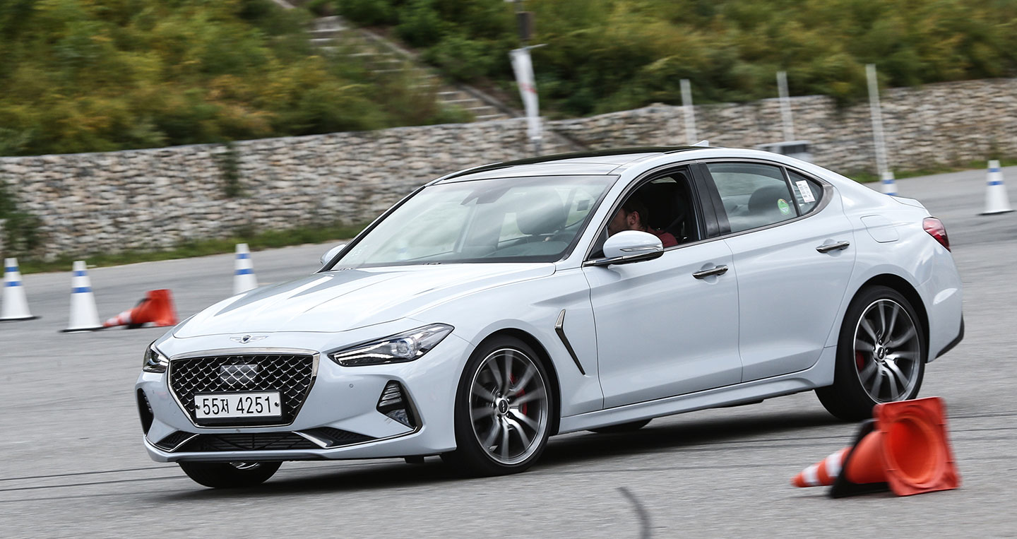 2019-genesis-g70-front-three-quarter-in-motion-03.jpg