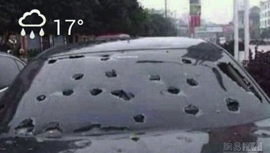 Hàng ngàn ôtô bị phá nát ở Trung Quốc 1405673236-9.jpg