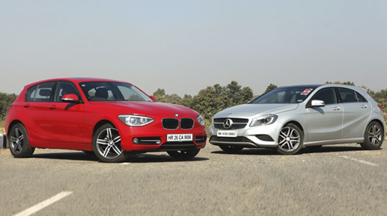 Mercedes A-Class vs BMW 1 Series – Ai sẽ là “vua”? bmw-1series-vs-mercedes-a-class (1).jpg