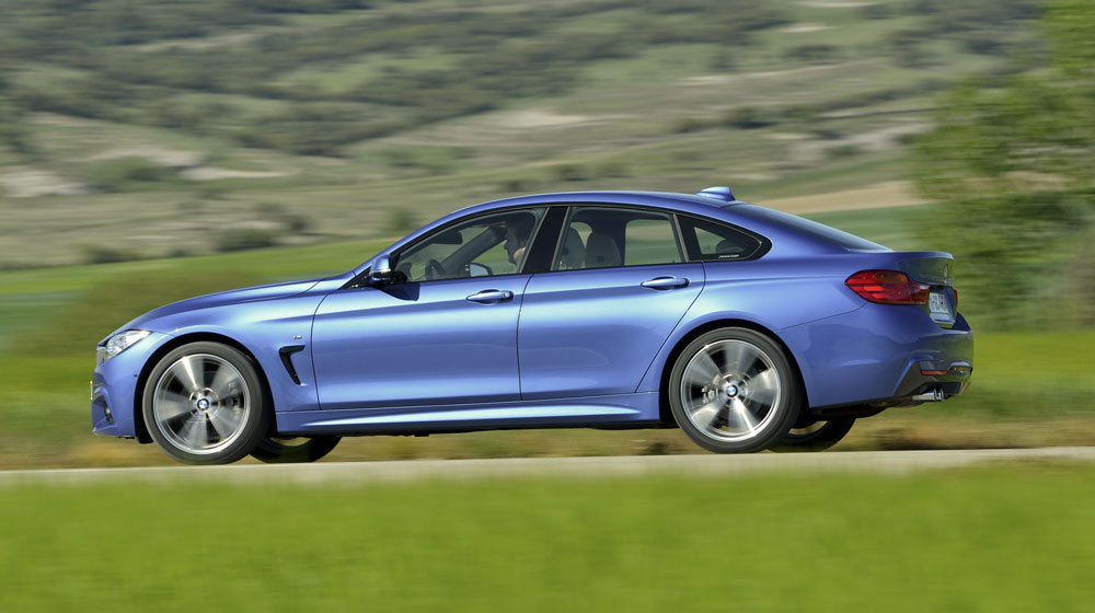 BMW 4 Series Gran Coupe: Mỹ miều và đa dụng 2015-bmw-428i-gran-coupe-side-rear-motion-view.jpg