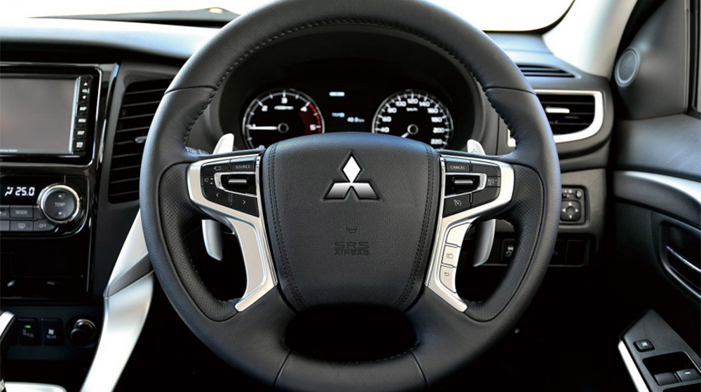 Chi tiết đối thủ của Toyota Fortuner và Ford Everest vừa ra mắt Mitsubishi-Pajero-Sport-TH-0007-850x567.jpg