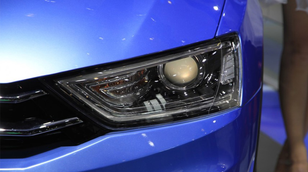 Cận cảnh Audi Q3 phiên bản “nhái” đến từ Trung Quốc Zotye-S21-headlight-at-the-2014-Chengdu-Motor-Show-900x600.jpg