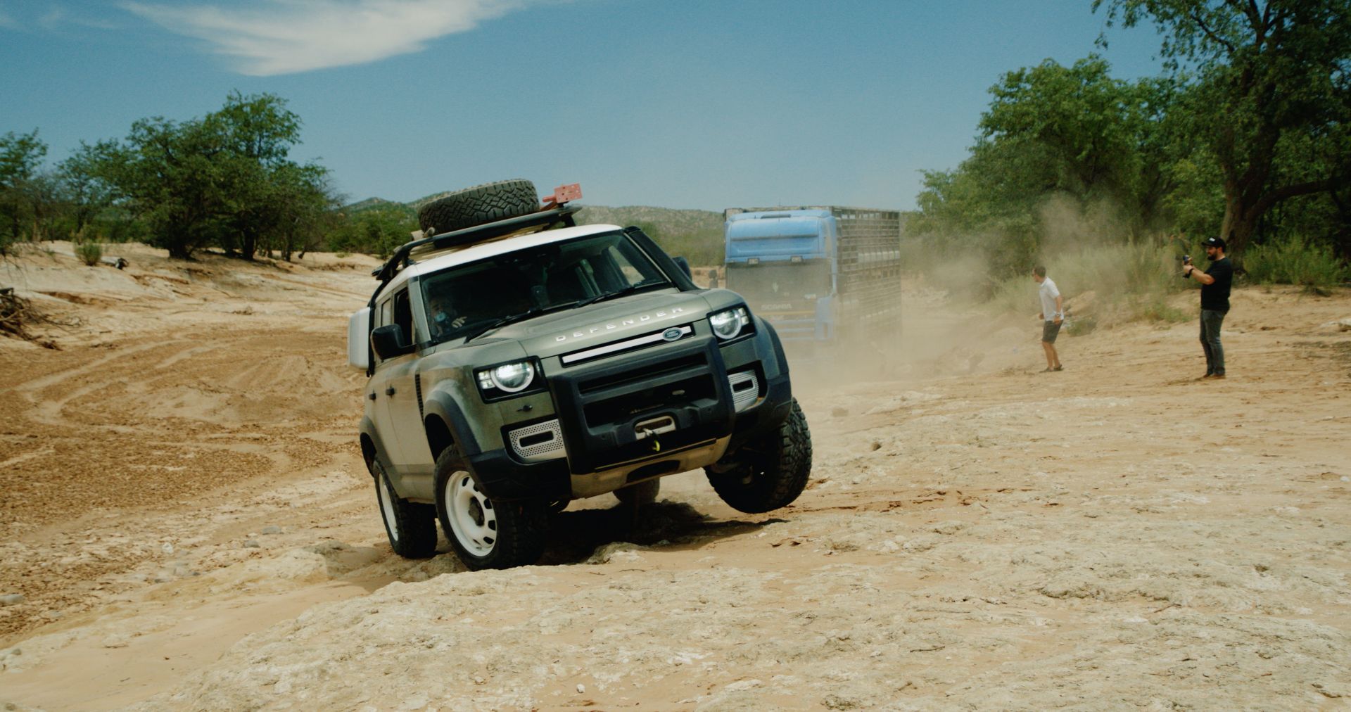 pair-of-2020-land-rover-defender-suvs-rescue-semi-truck-stuck-in-namib-desert-2.jpg