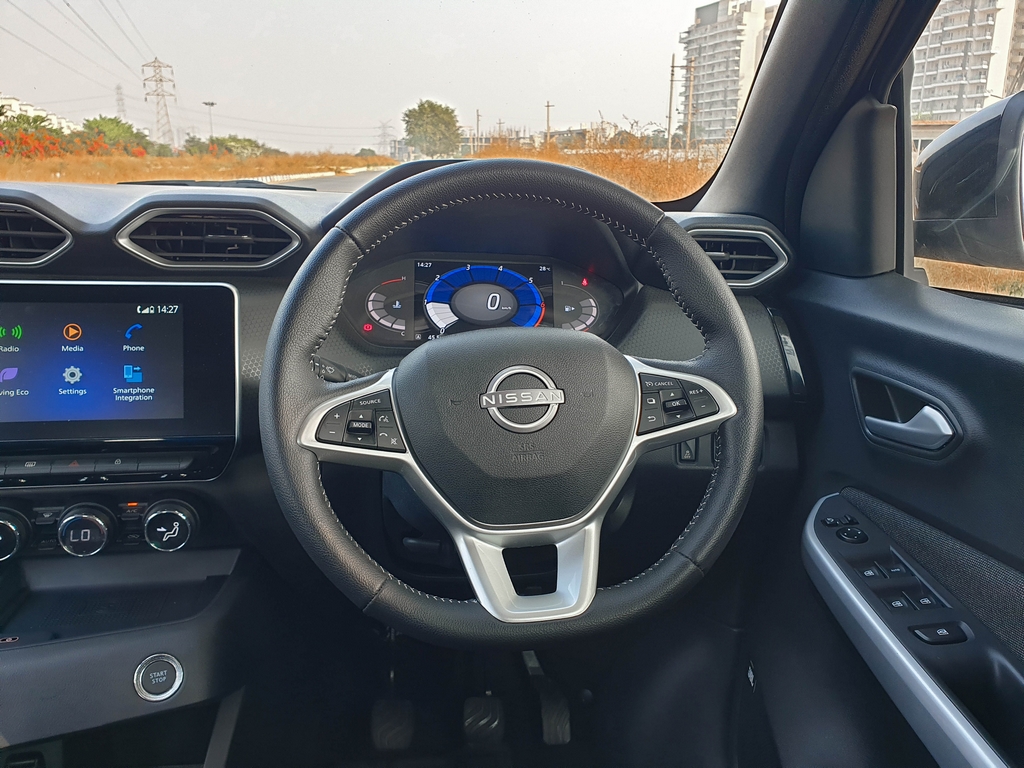all-new-nissan-magnite-first-review-interior-steer-ebbf.jpg