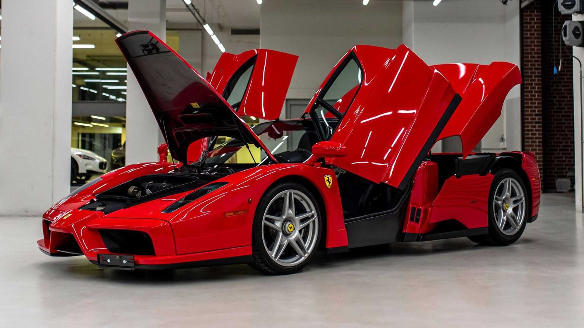 Rời đội đua Ferrari, Sebastian Vettel rao bán 5 siêu xe Ferrari hàng hiếm 2004-ferrari-enzo-of-sebastian-vettel-doors-and-hatches-open.jpg