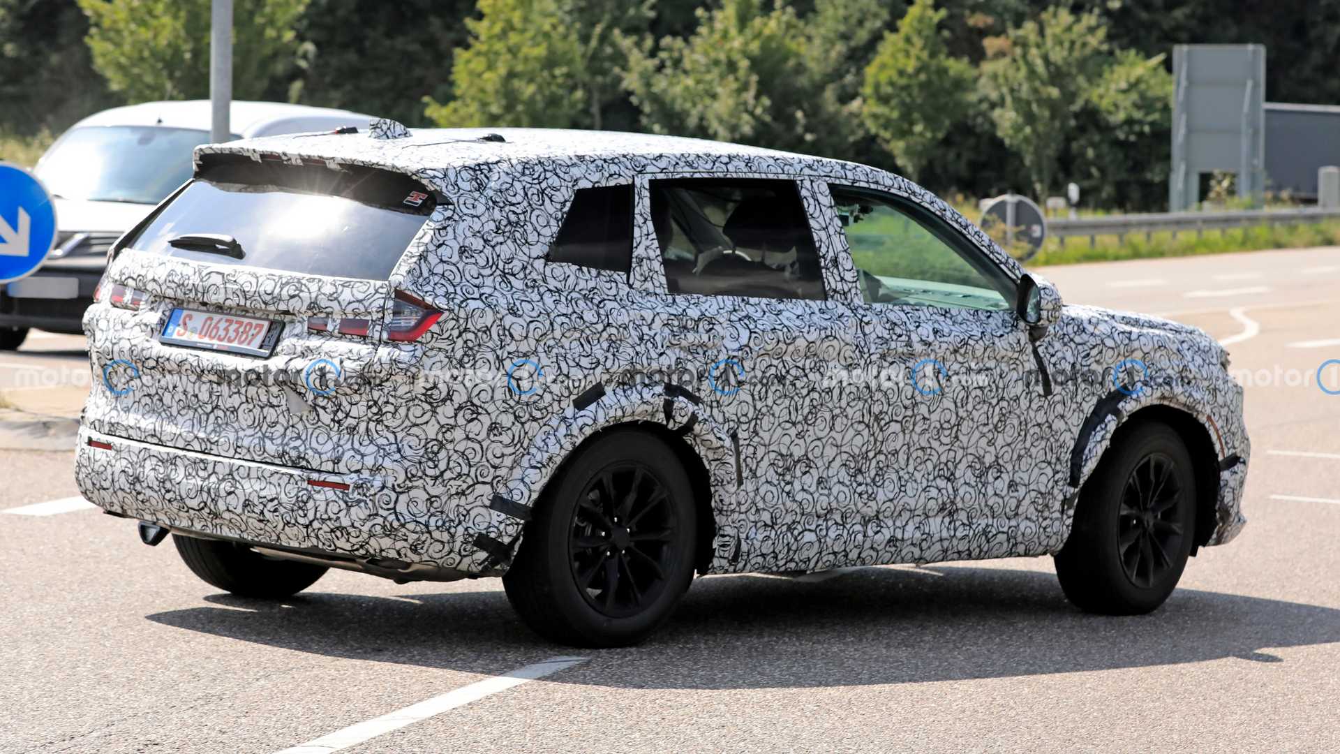 2023-honda-cr-v-new-spy-photos-rear-three-quarters.jpg